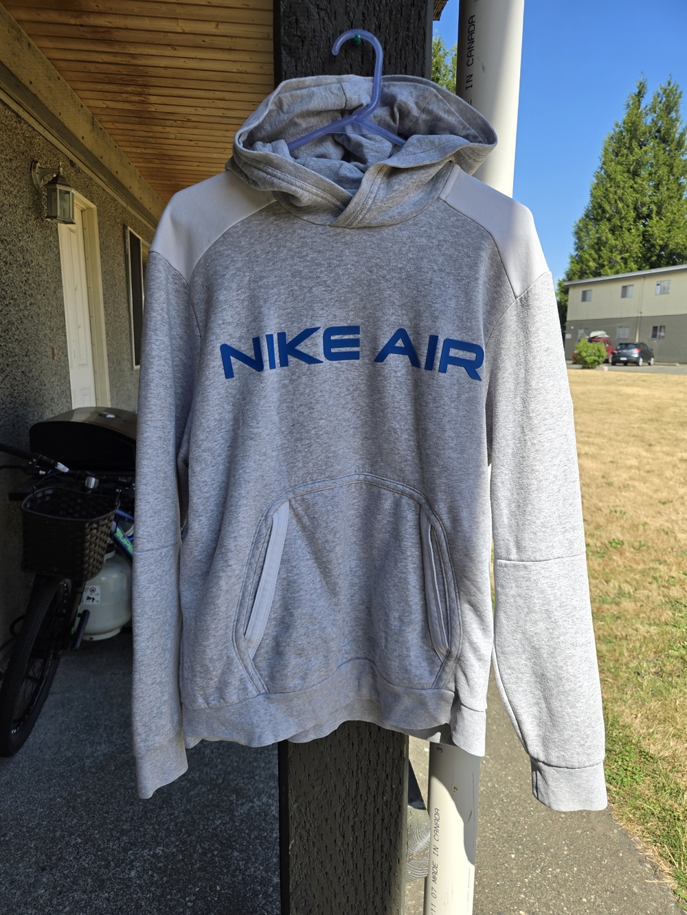 Nike Air Light Gray Pullover Hoodie with Blue Logo